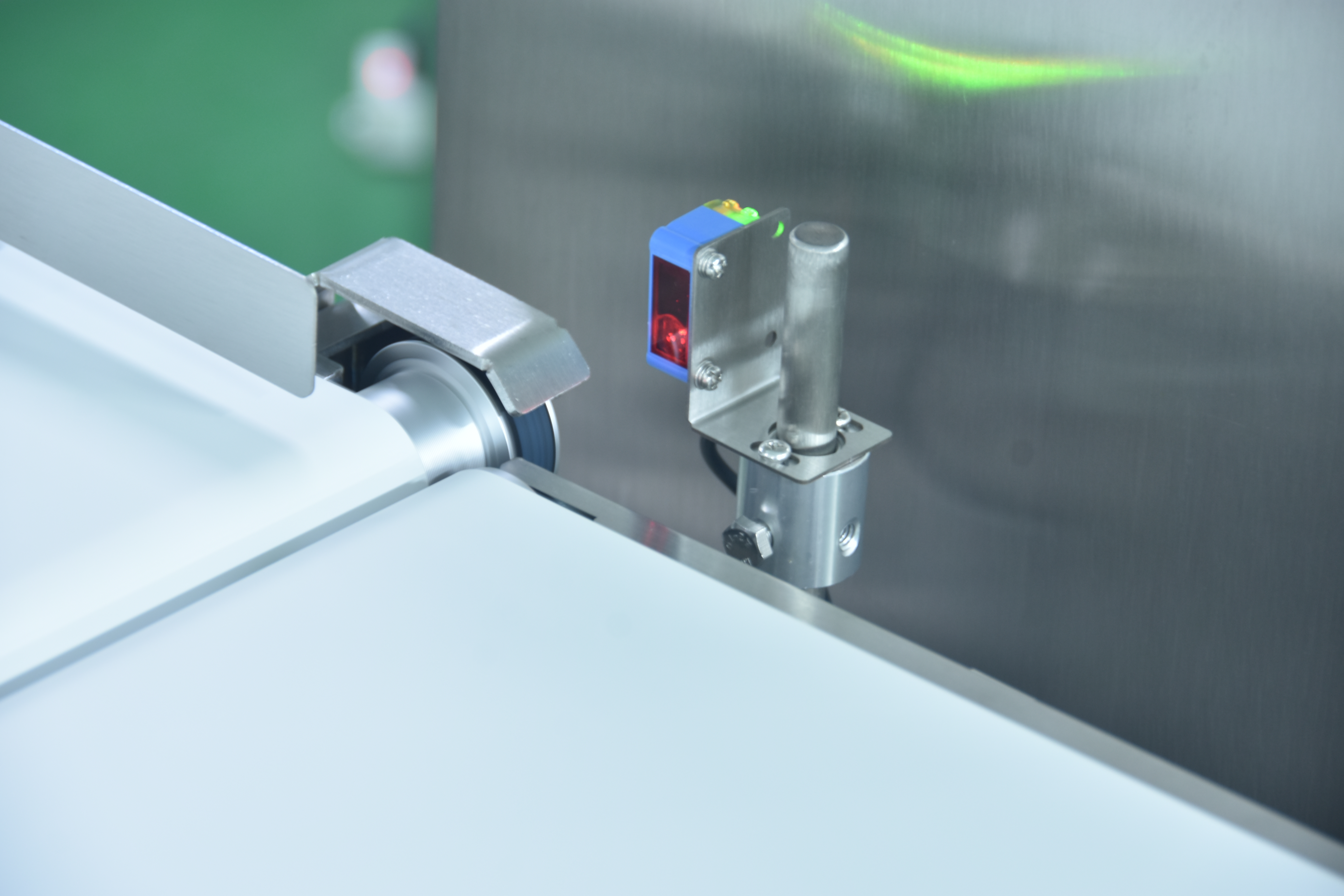 Infrared sensor for reject timing
