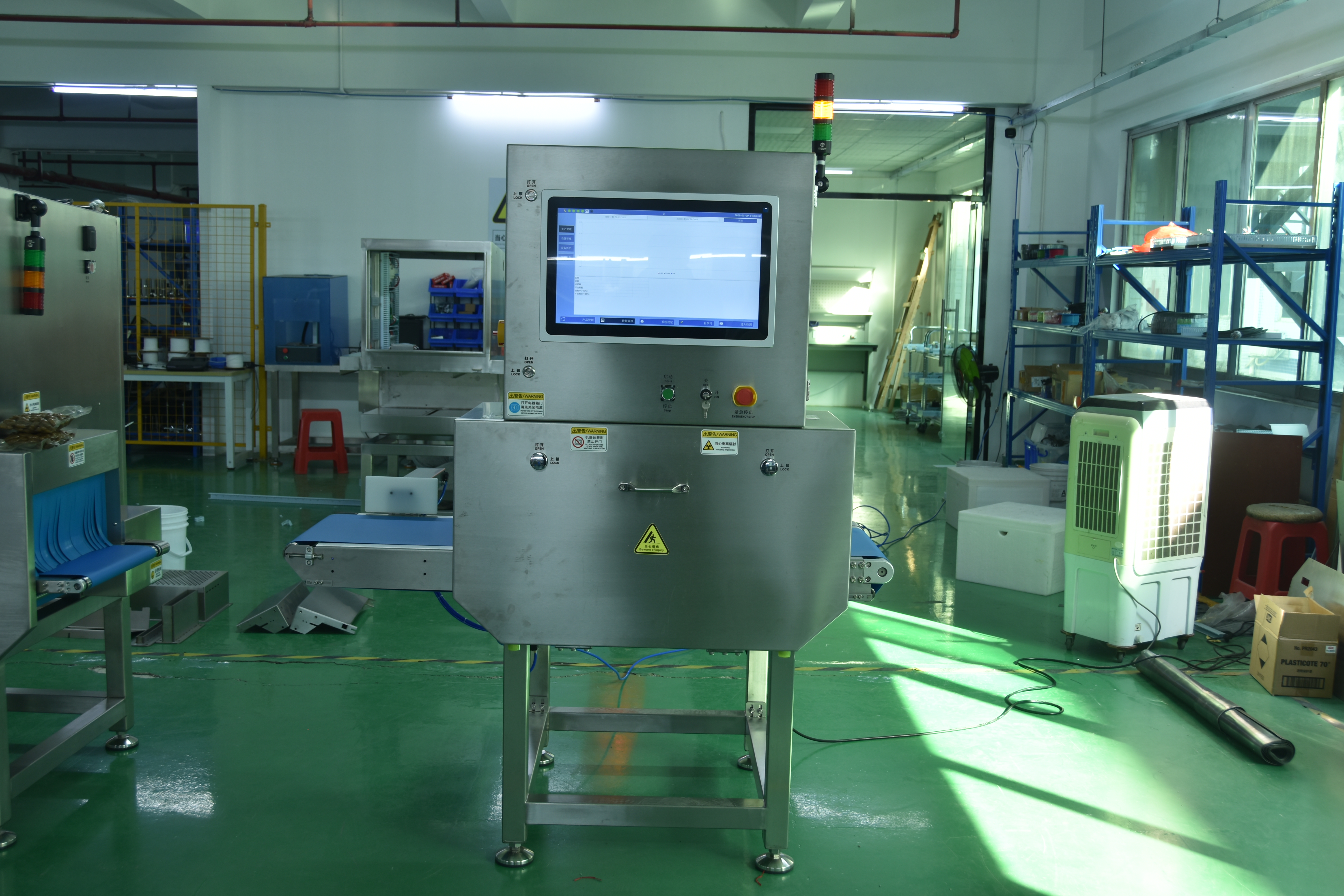 X-Ray Inspection System with Integrated Pusher for Heavy Packaging