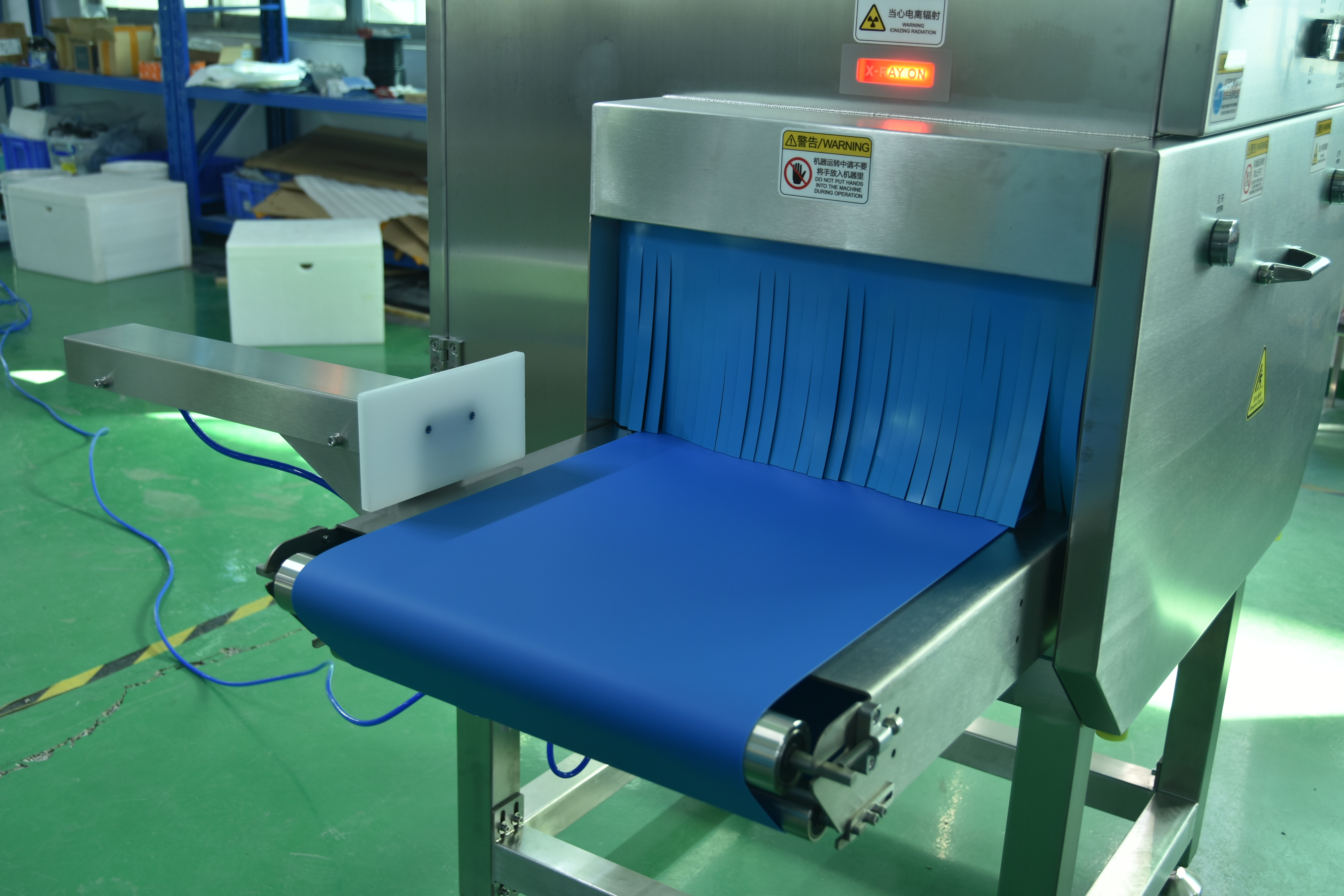 X-Ray Inspection System with Integrated Pusher for Heavy Packaging